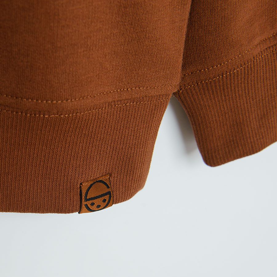 Brown sweatshirt with tracter print
