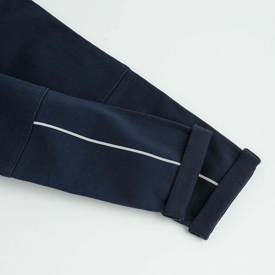 Dark blue trousers with cord on the waist