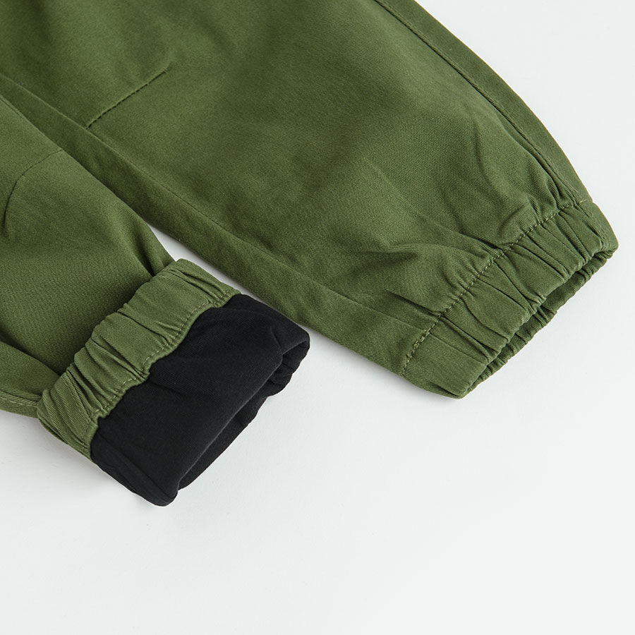 Khaki trousers with side pockets
