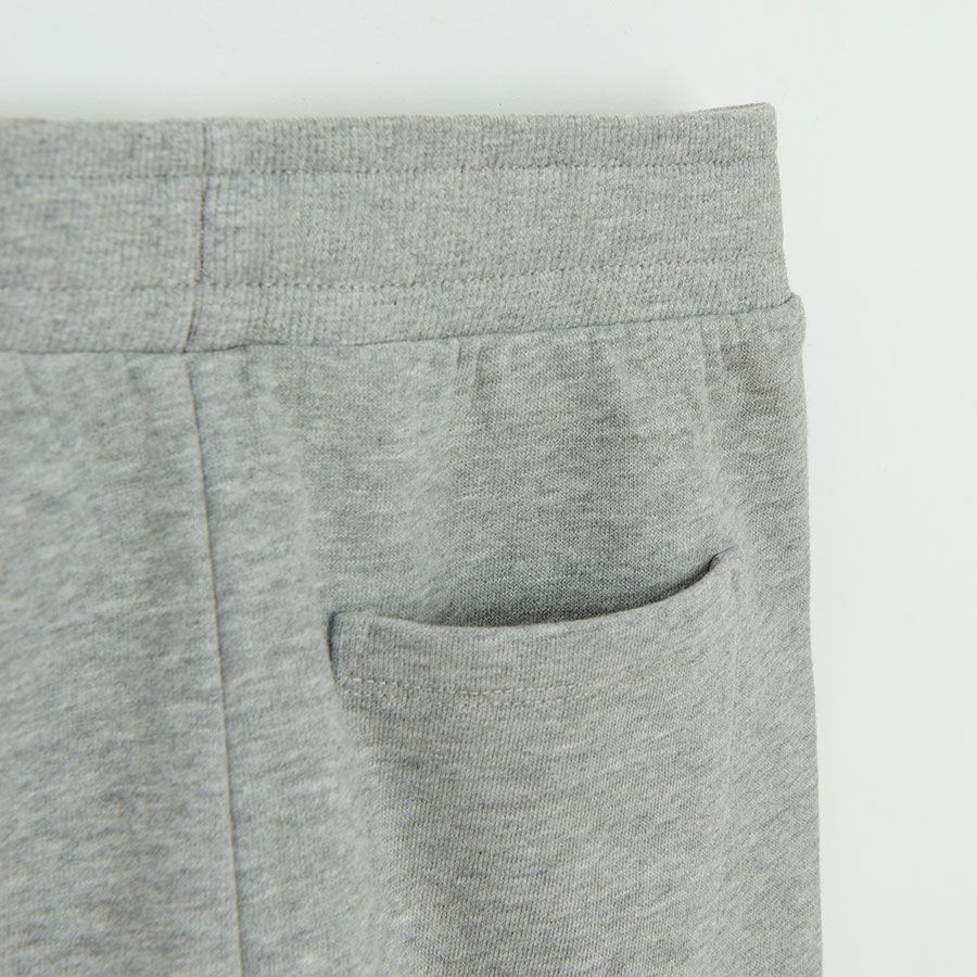 Grey jogging pants with monster print