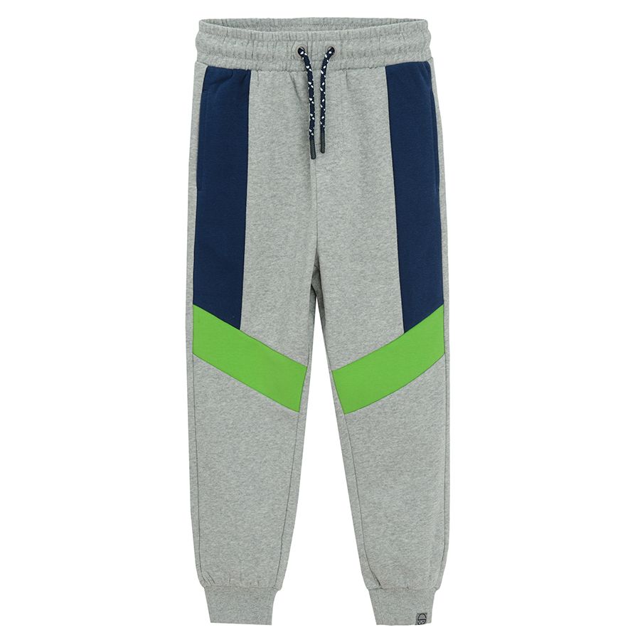 Grey jogging pants with blue and green stripes