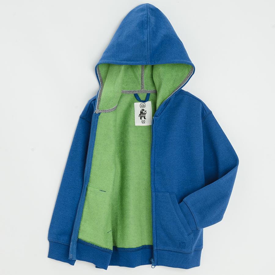 Blue zip through sweatshirt with fluo green lining on the hood