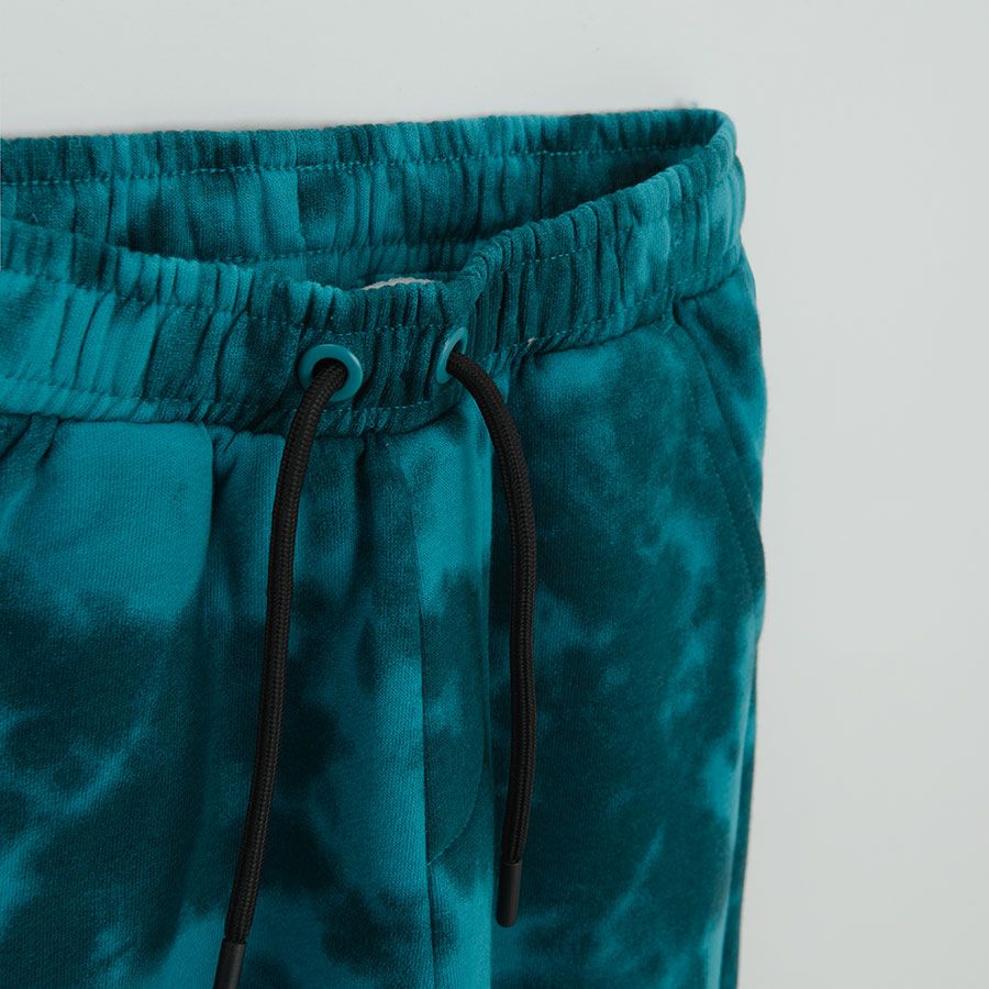Blue tie dye jogging pants with elastic waist