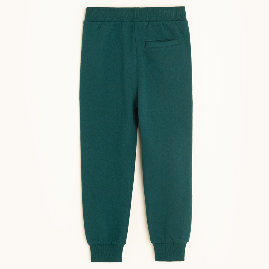 Green jogging pants