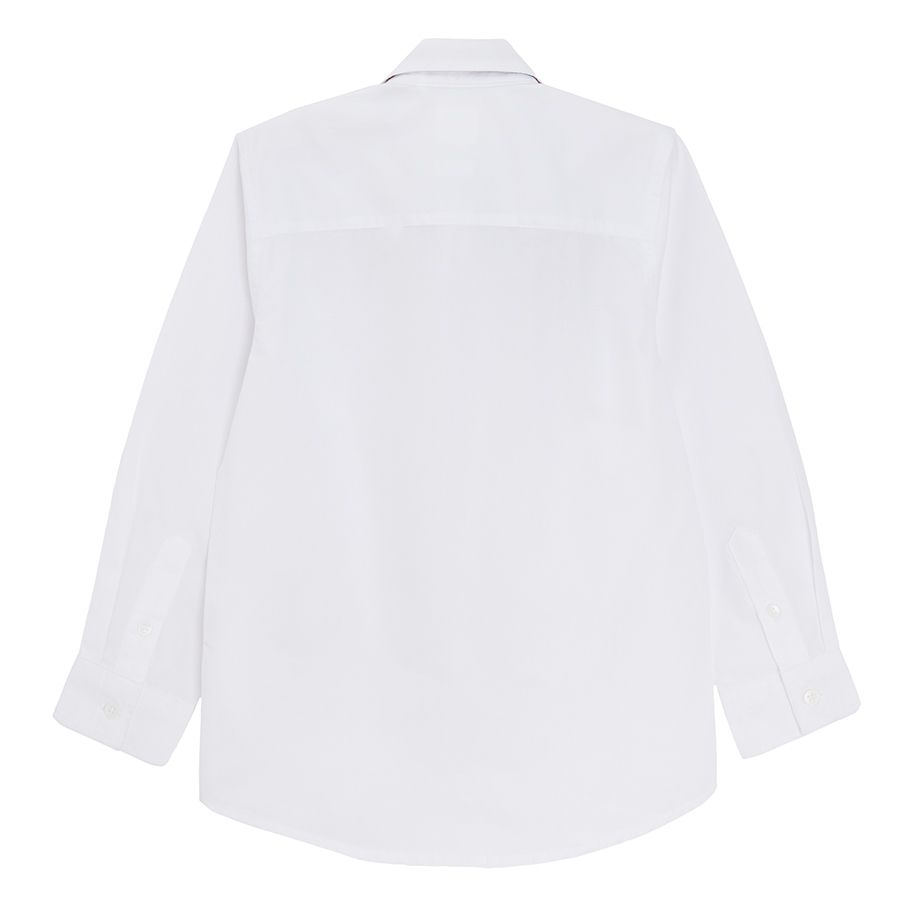 White long sleeve button down shirt and red bow tie