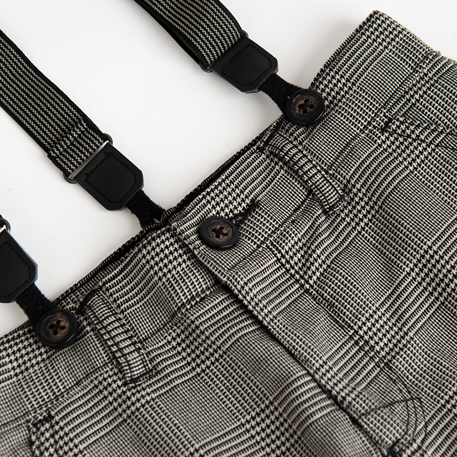 Grey pants with suspenders