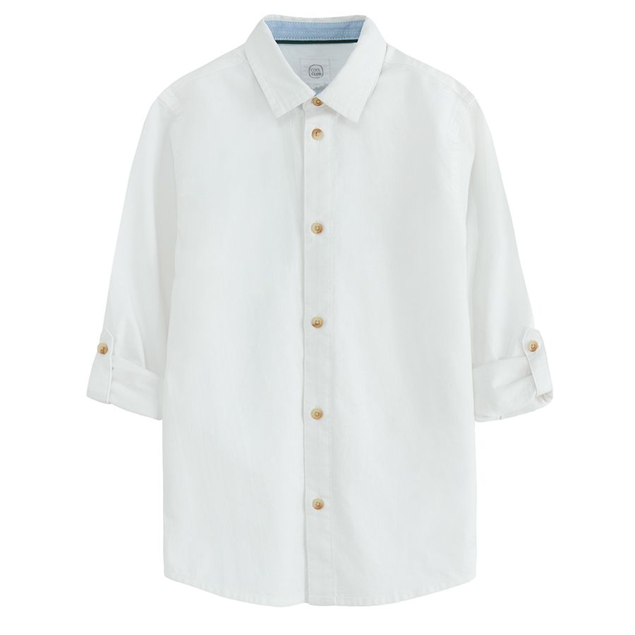 White long sleeve shirt with sleeve rolling up to a button