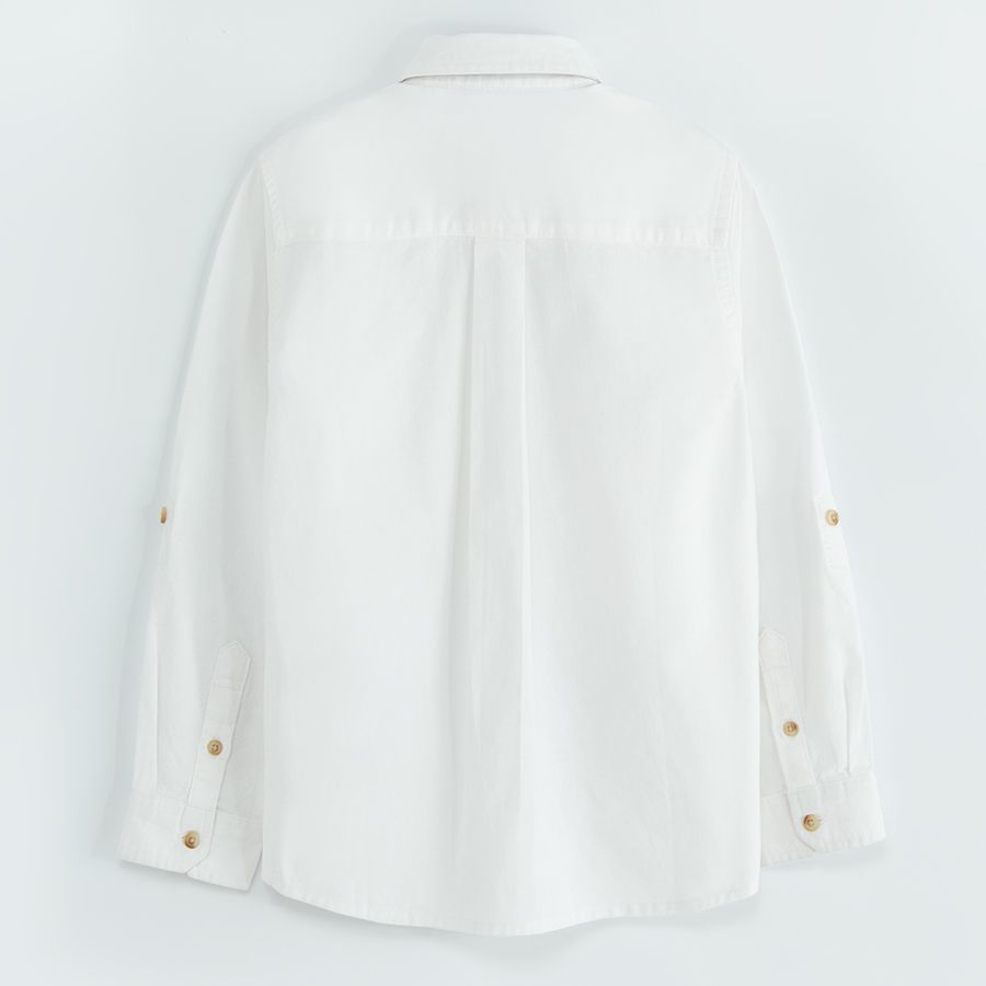White long sleeve shirt with sleeve rolling up to a button