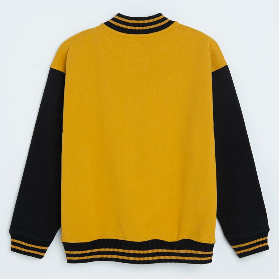 Yellow and black buttons sweatshirt