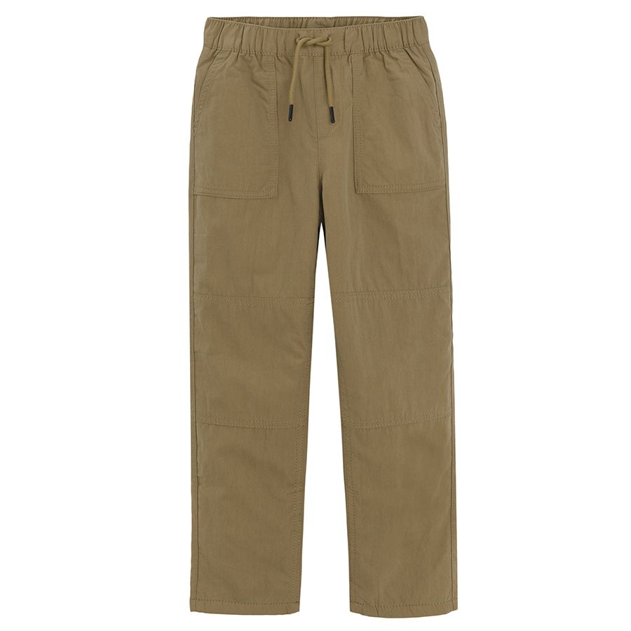 Brown trousers with side pockets