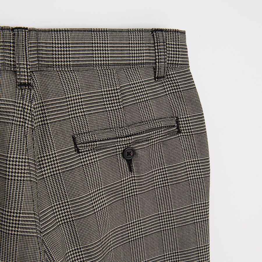 Grey checked trousers