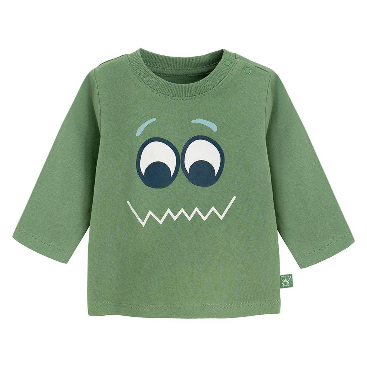 Green long sleeve blouse with funny face print
