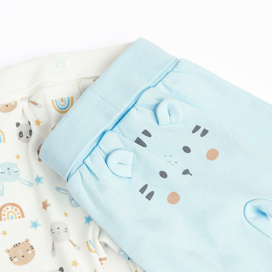White and blue footed leggings with animals print