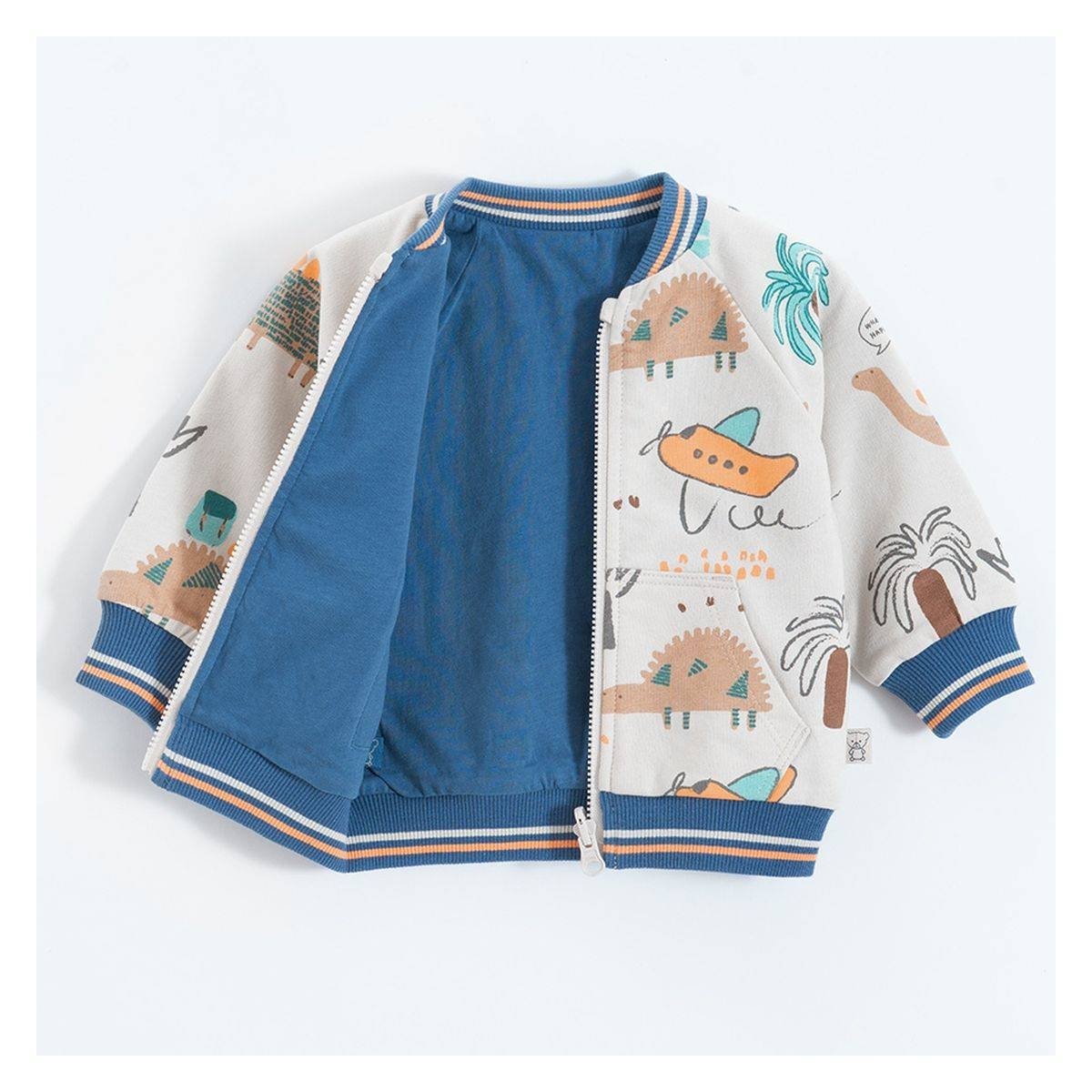 Blue and reversible ecru with dinosaurs print zip through sweatshirt