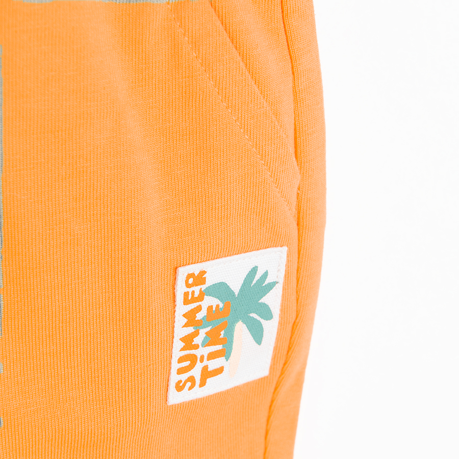 Orange jogging pants