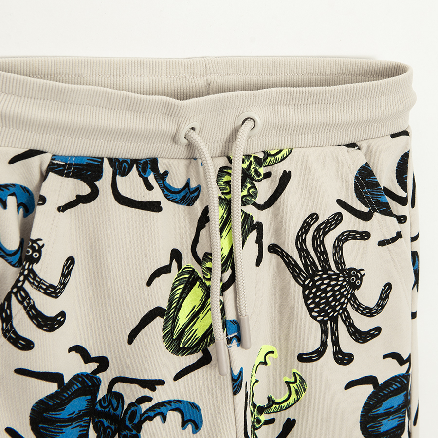Sweatpants with beetles print