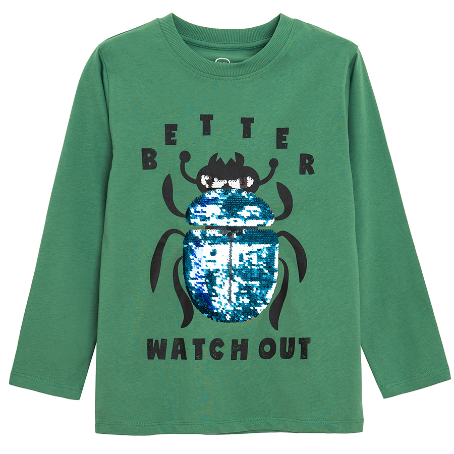 Green long sleeve blouse with blue sequins beetle