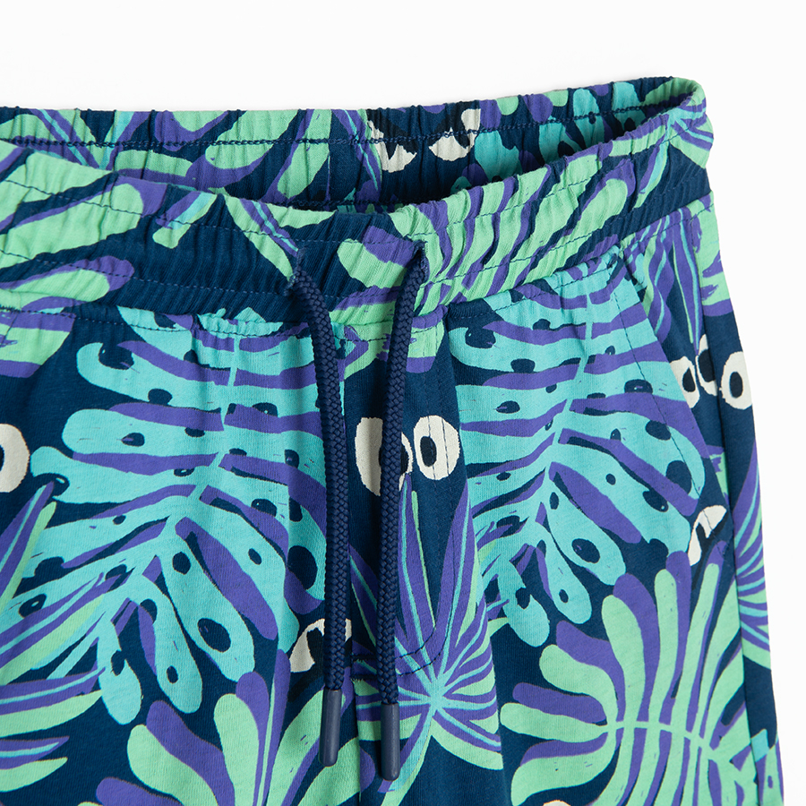 Dark blue shorts with leaves and eyes