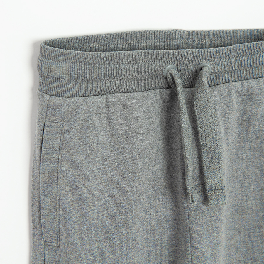 Grey cargo style sweatpants with cord