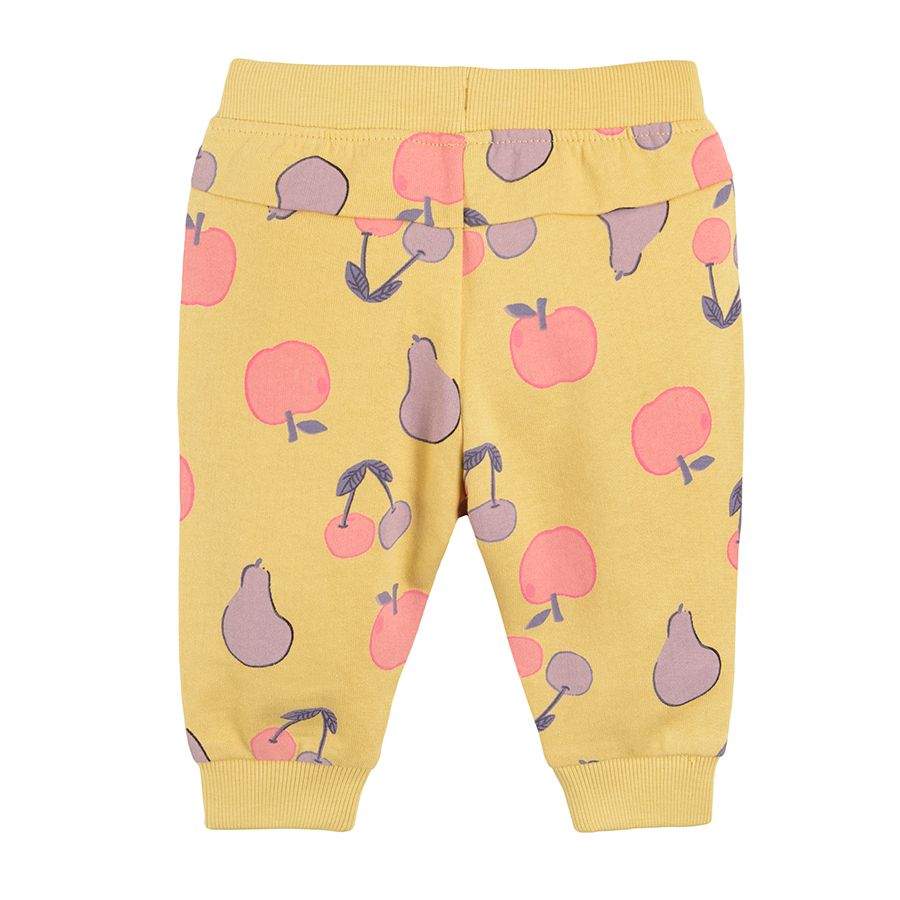 Yellow jogging pants with fruit print