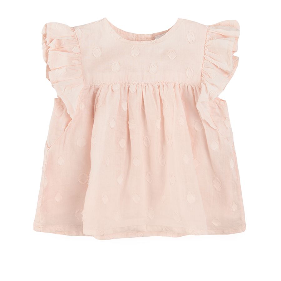 Light pink short sleeve blouse with ruffle on the sleeve
