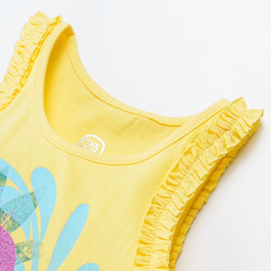 Yellow sleeveless blouse with ruffles and parrots