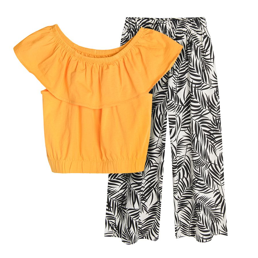 Yellow sleeveless blouse with ruffles and white pants with black patters clothing set