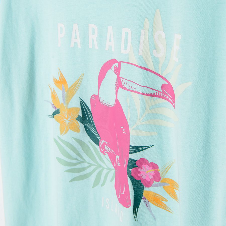 Light blue short sleeve blouse with parrots print