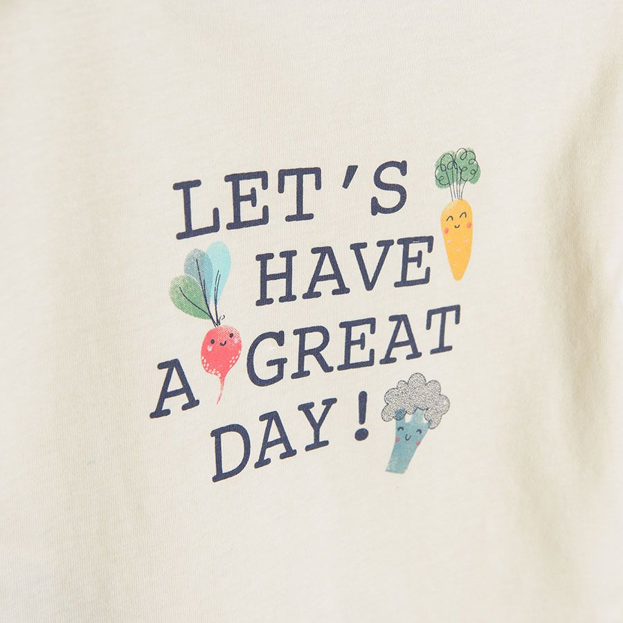 Short sleeve white blouse with *Lets have a great day* print and pink leggings