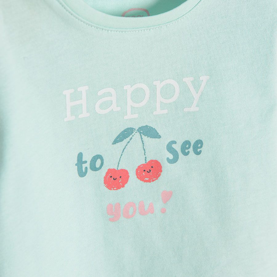 Light blue long sleeve blouse with "Hapy to see you" print and cherries