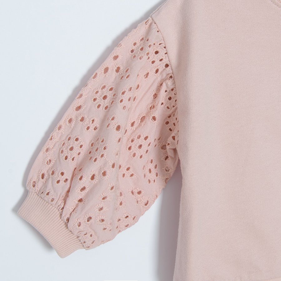 Light pink sweatshirt with embroidered sleeves