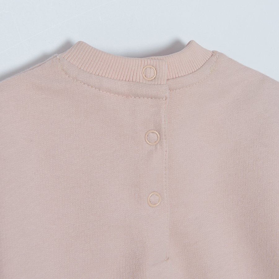 Light pink sweatshirt with embroidered sleeves