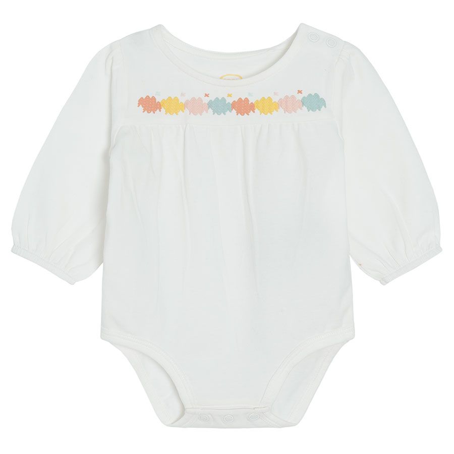 Cream long sleeve bodysuit with embroideries on the top