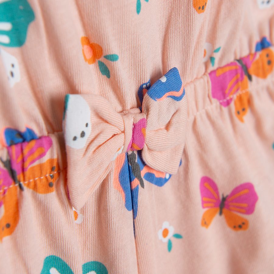 Light pink sleeveless romper with butterflies print