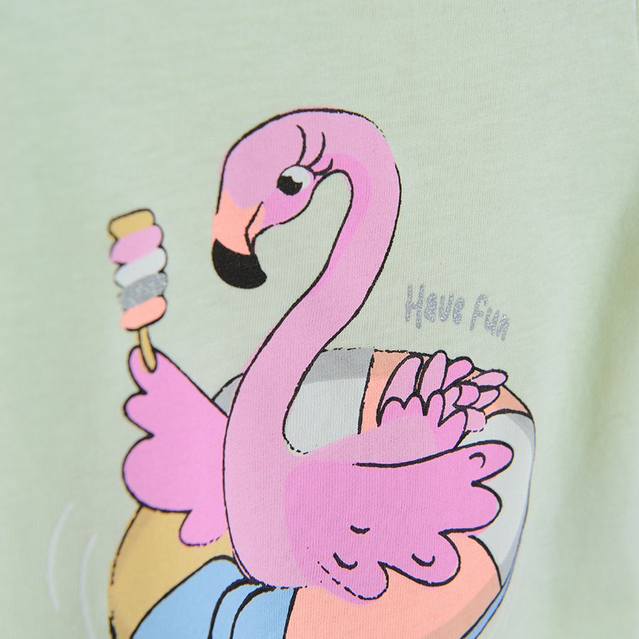 Light green short sleeve T-shirt with flamingo floatie
