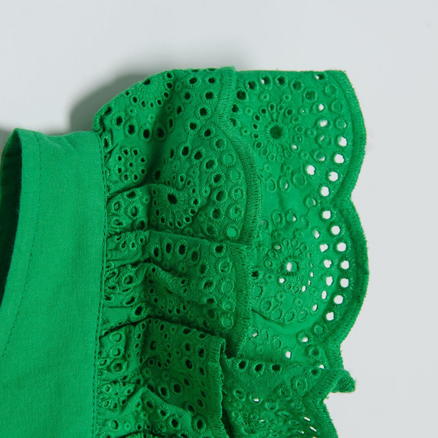 Green dress with ruffles on sleeves