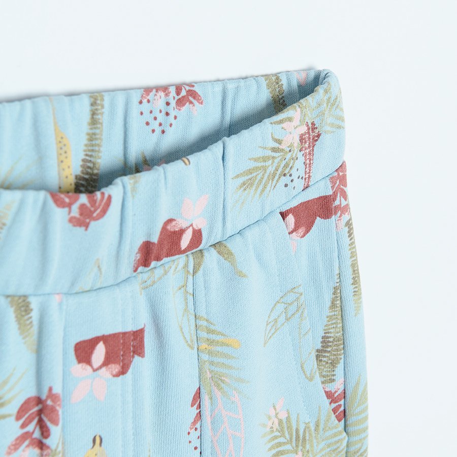 Light blue jogging pants with wild animals print