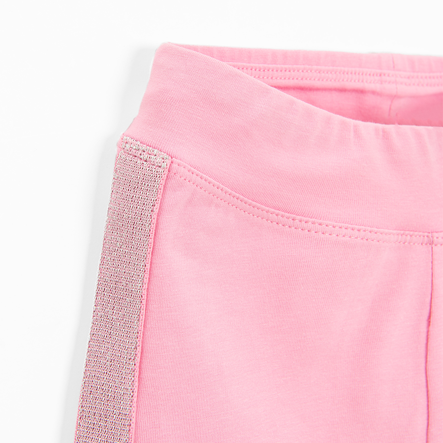 Pink 3/4 leggings with silver stripe on the side