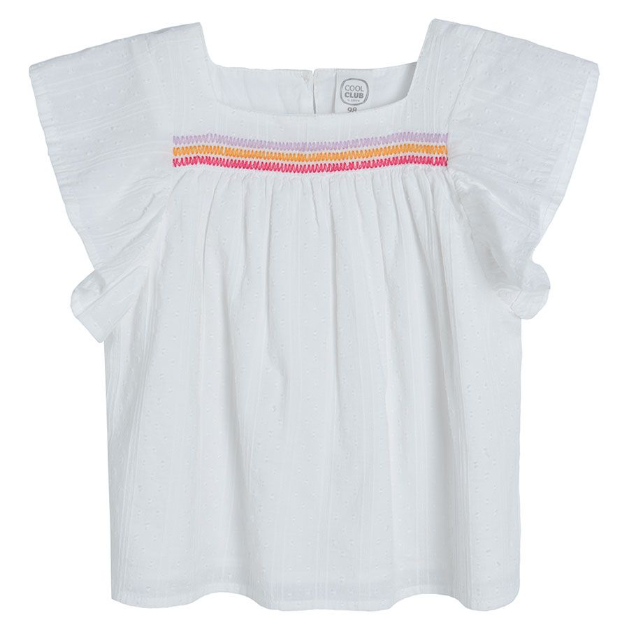 White sleeveless blouse with square embrodered neckline and ruffles on the shoulders