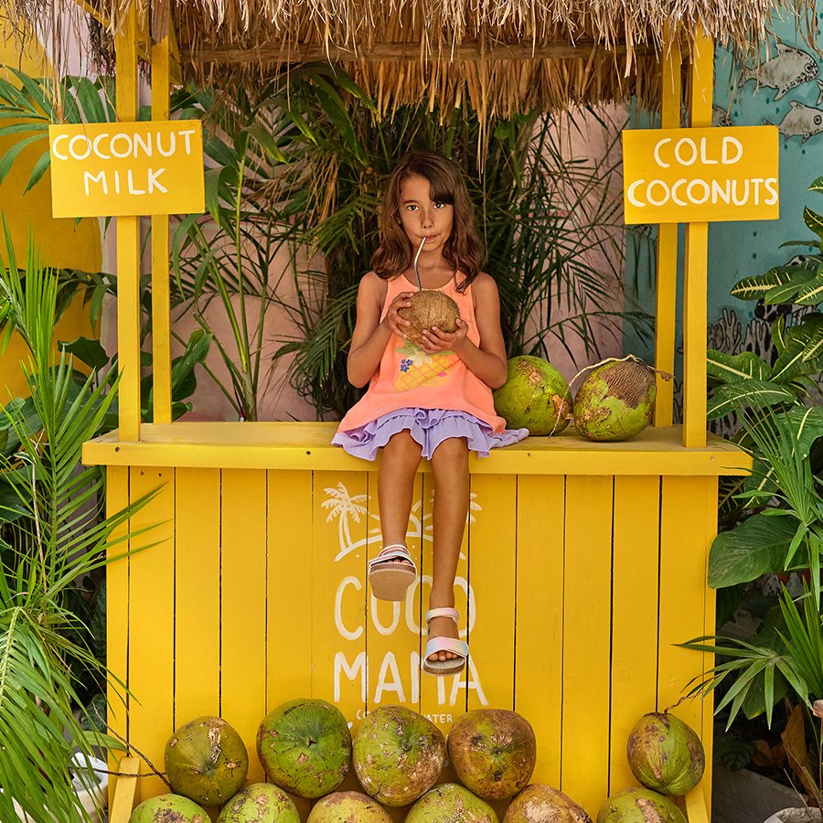 Fluo coral sleeveless T-shirt with sequin pineapple print
