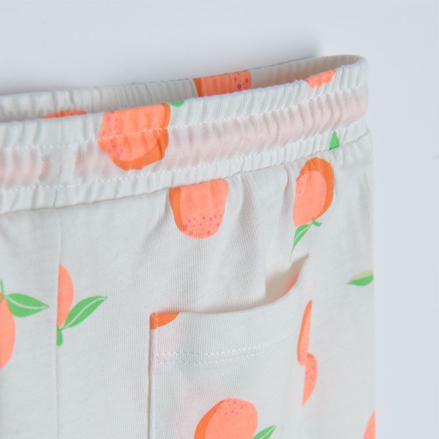 White shorts with oranges print and elastic waist