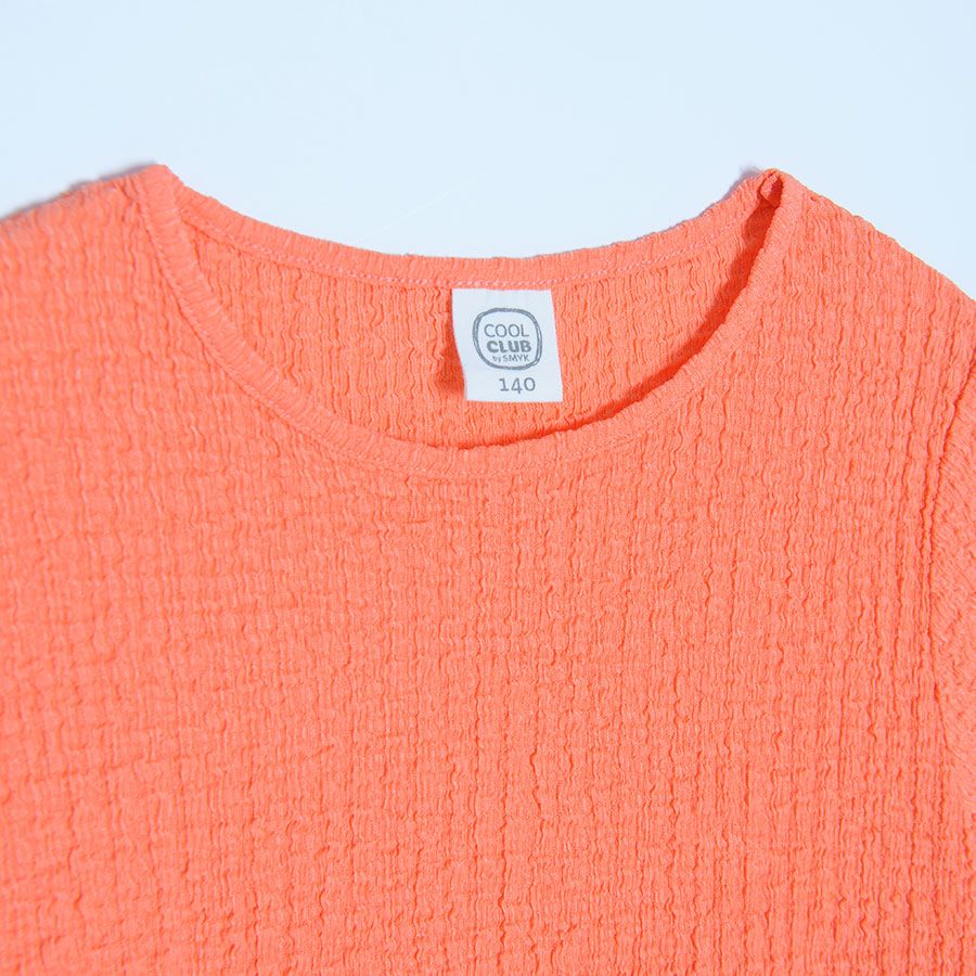Coral short sleeve T-shirt with elastic cords on the sides