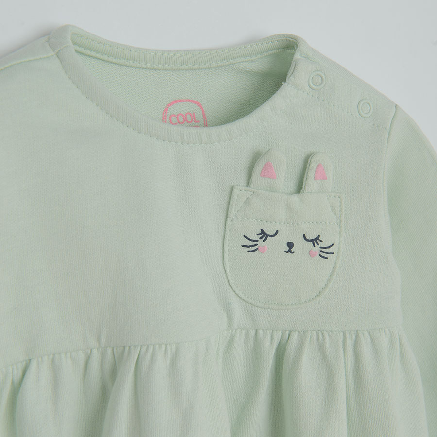 Light green long sleeve dress with kitten on the chest pocket
