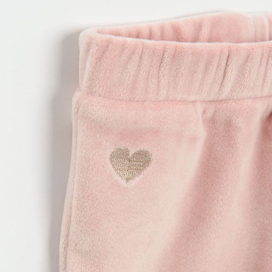Pink velvet jogging pants with small gold heart print