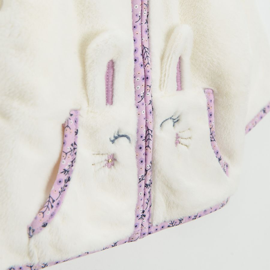 White fleece zip through jacket with bunny pattern on the side pockets