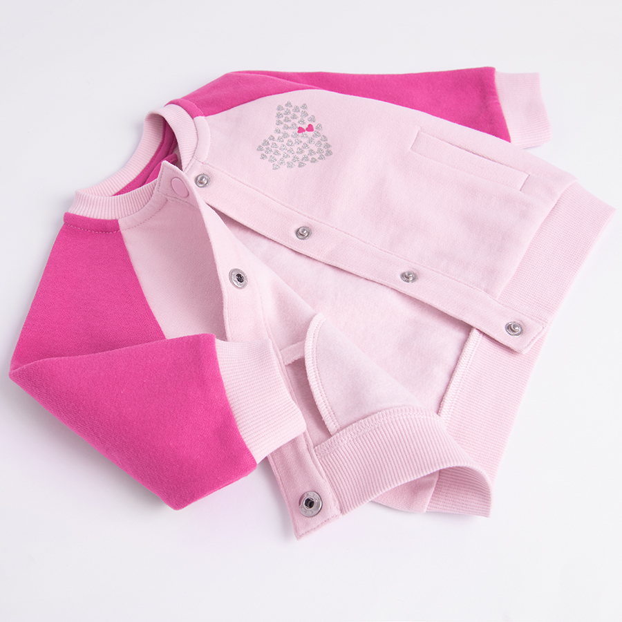 Pink button down sweatshirt with 'Je t'aime' print on the back