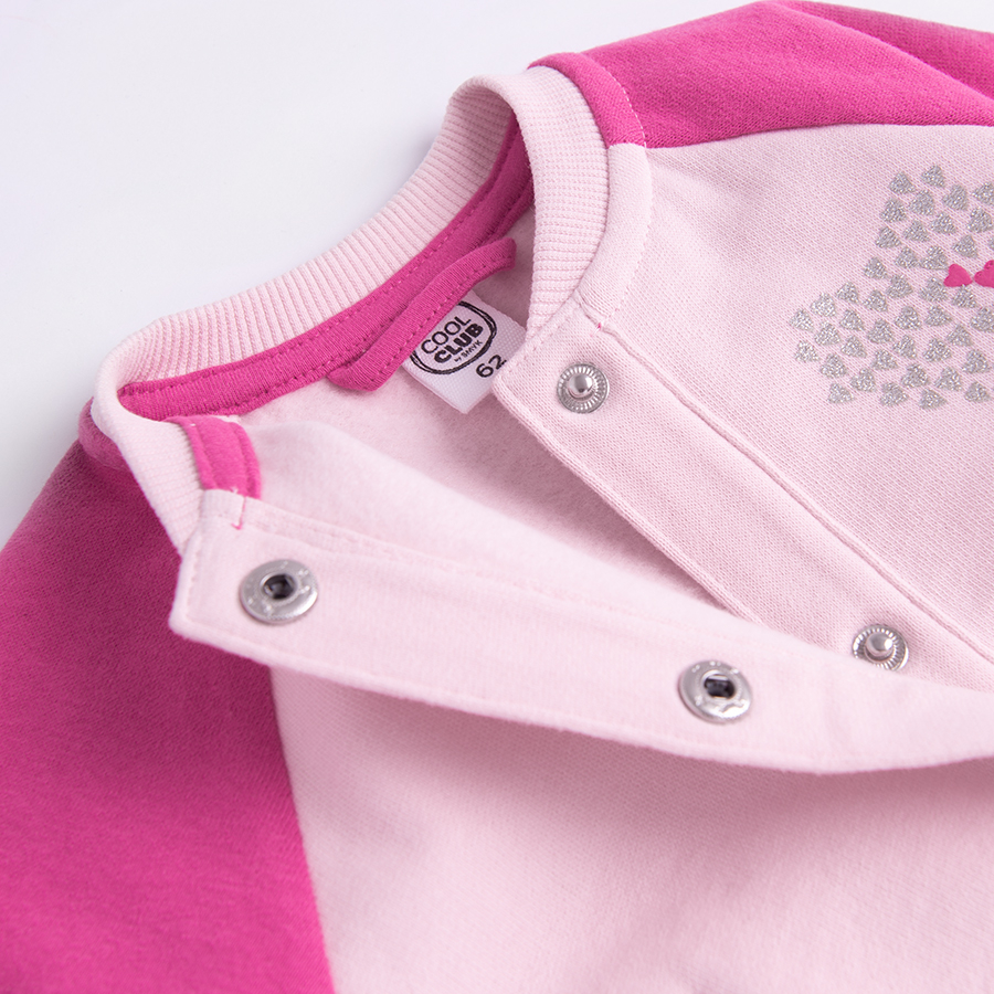 Pink button down sweatshirt with 'Je t'aime' print on the back