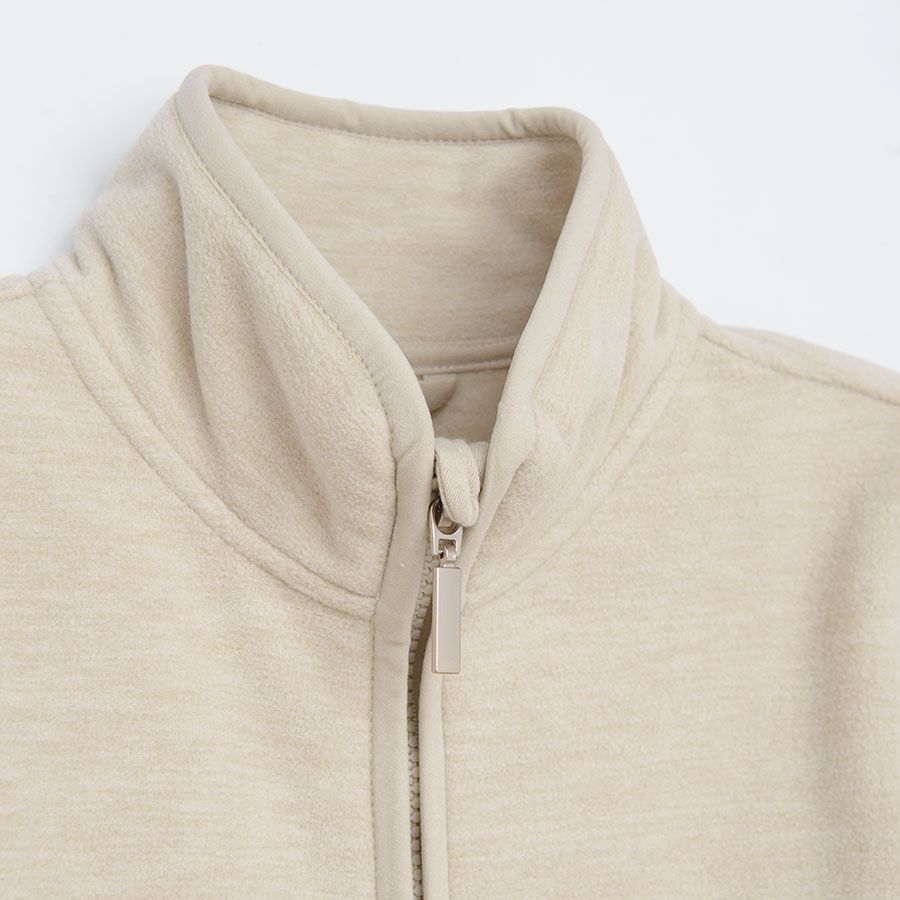 Beige zip through sweatshirt with high neck and kitten print on the pockets