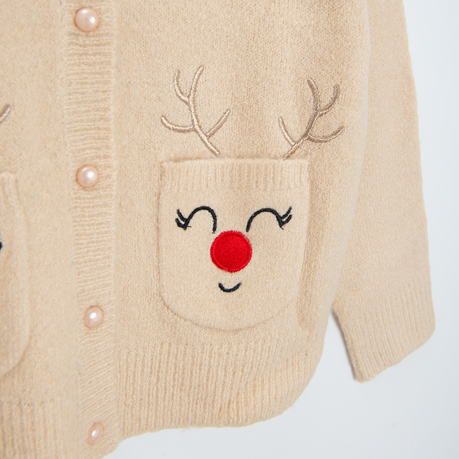 White cardigan with raindeer print on the side pockets