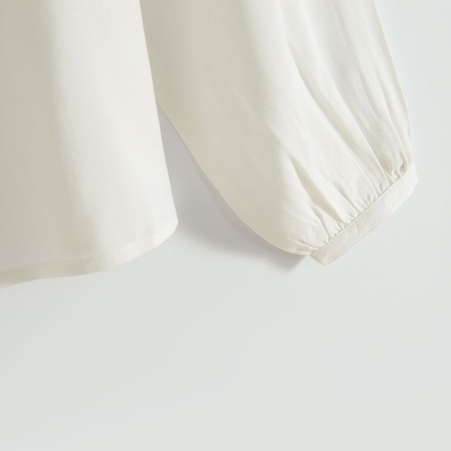 White long sleeve shirt with raffles